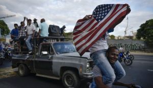 L’opposizione celebra nelle strade di Caracas – Foto Carlos Becerra (Bloomberg)